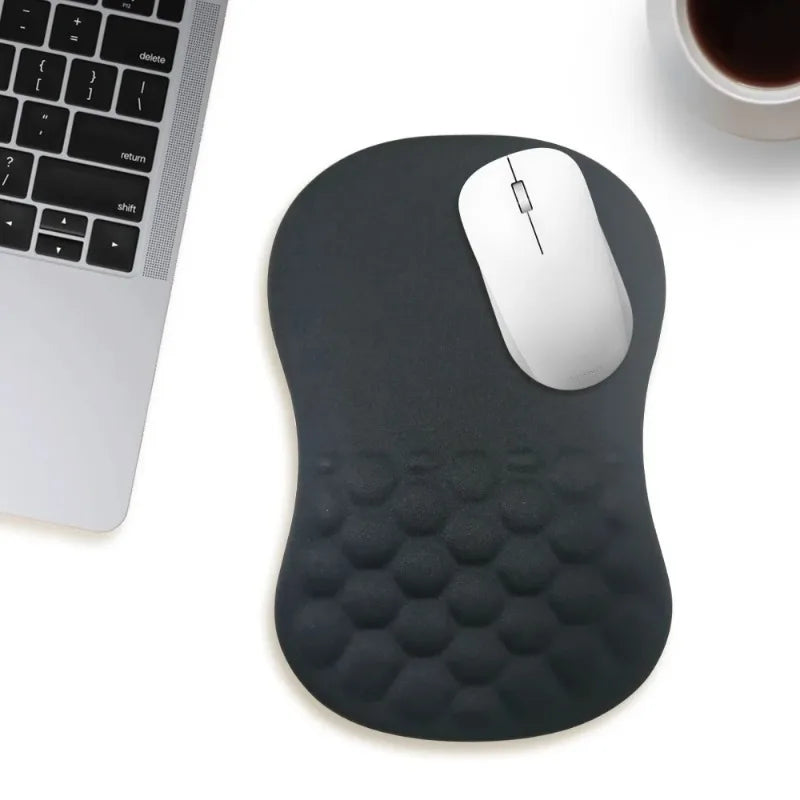 Ergonomic mouse pad