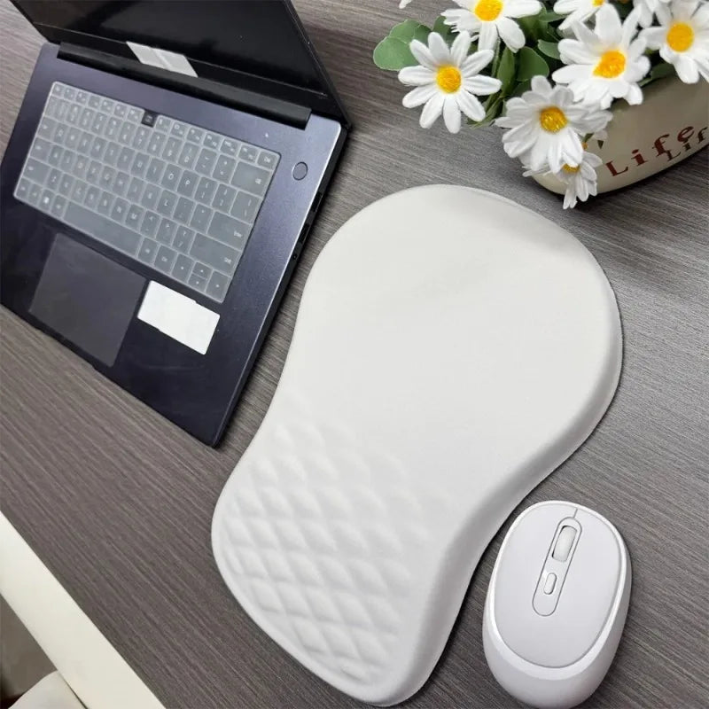 Ergonomic mouse pad